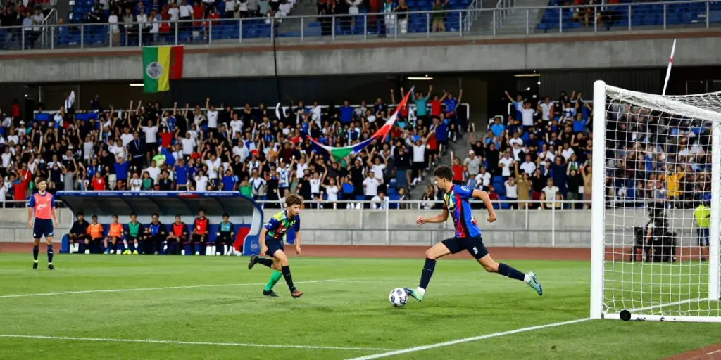 Best young strikers showcasing talent in a vibrant stadium during a match.